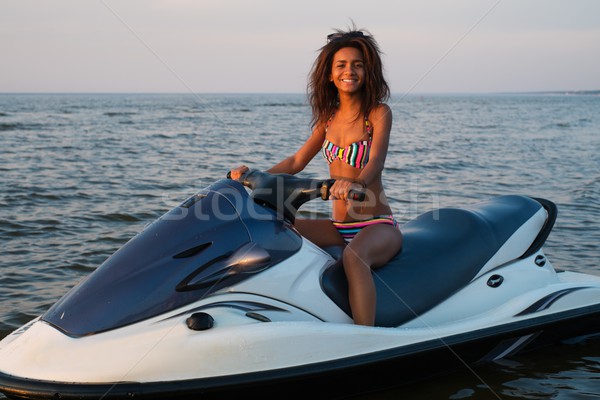 Nina sesión jet ski cielo sonrisa mar Foto stock © Nejron