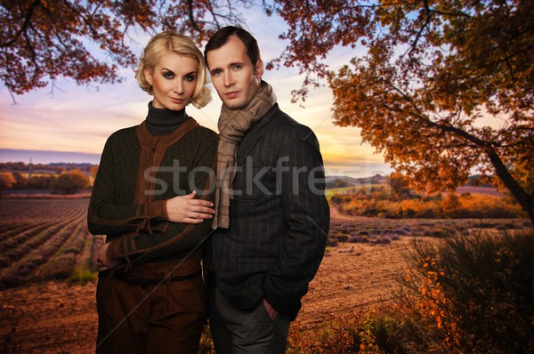 Elegante casal campo de lavanda mulher nuvens moda Foto stock © Nejron