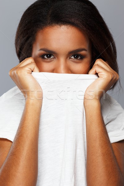 Heiter jungen schwarze Frau isoliert grau Lächeln Stock foto © Nejron