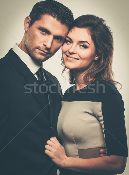 Happy smiling couple in suit and dress  Stock photo © Nejron