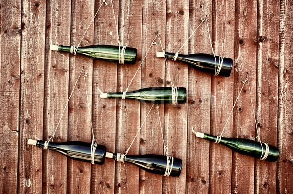 Wall designed with wine bottles  Stock photo © Nejron