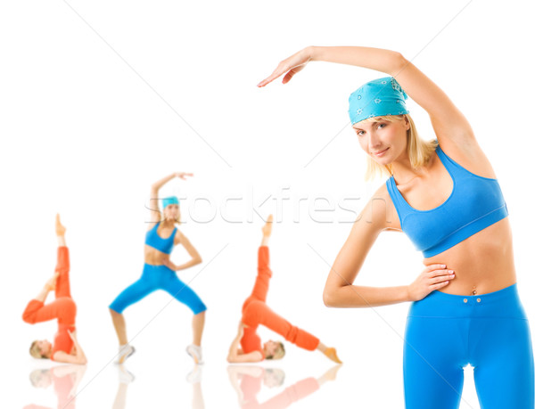 Group of women doing fitness exercise isolated on white. Lots of Stock photo © Nejron