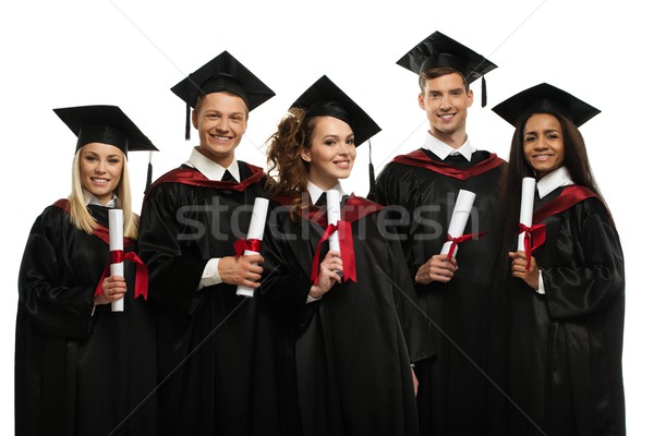 Multi ethnic group of graduated young students isolated on white Stock photo © Nejron