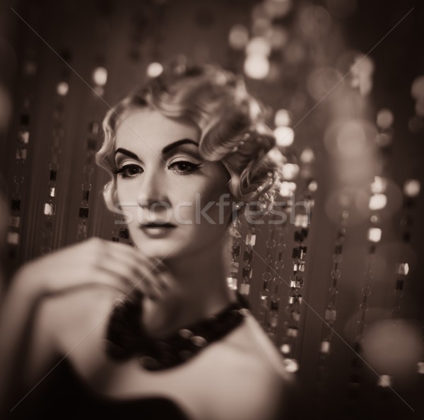 Toned picture of elegant blond retro woman  with beautiful hairdo  Stock photo © Nejron