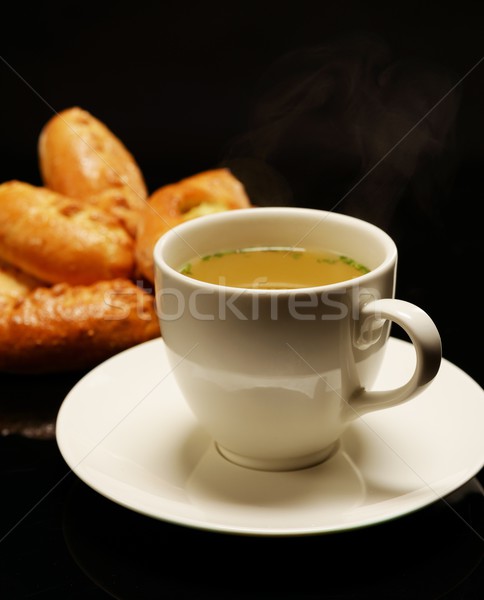 Hot bullion in cup with tasty tarts  Stock photo © Nejron