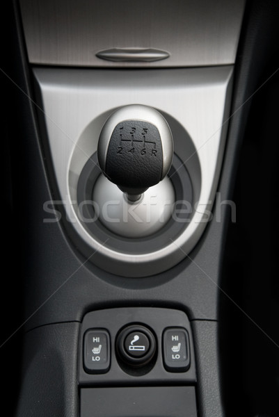 Six speed gear stick in a brand new sport car Stock photo © Nejron