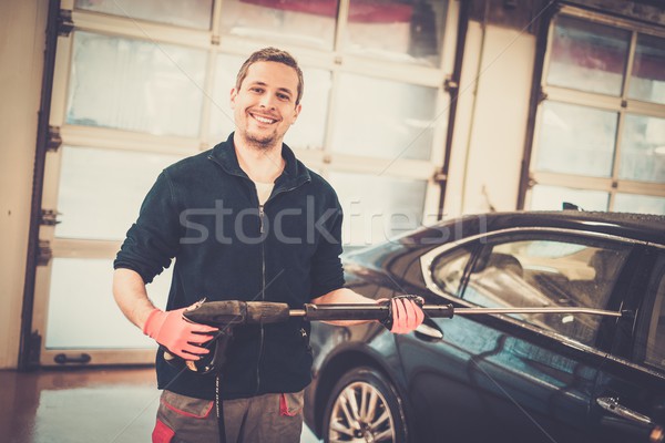 Feliz trabajador lavado de coches negocios coche vidrio Foto stock © Nejron