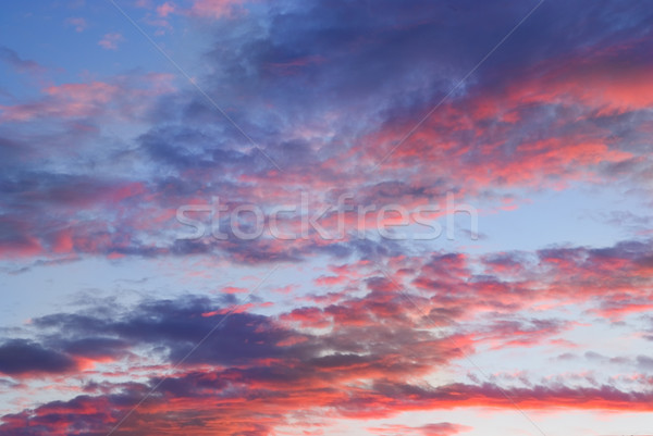 Clouds at sunset time Stock photo © Nejron
