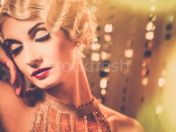 élégante blond rétro femme or robe Photo stock © Nejron