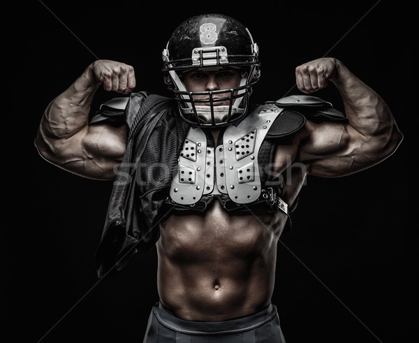 American football player wearing helmet and protective armour  Stock photo © Nejron