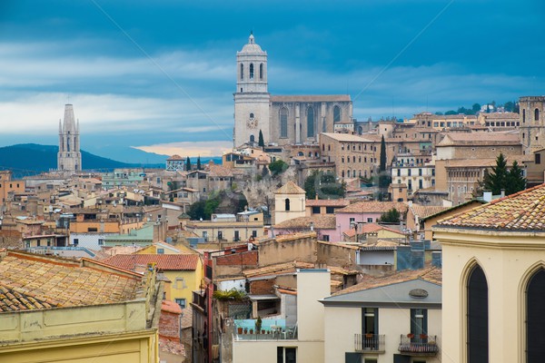 Cathedral view over rooftops of old town Girona, Spain Stock photo © Nejron