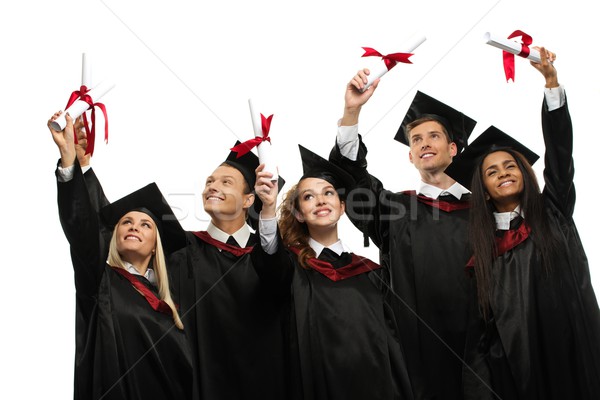 Multi ethnic group of graduated young students isolated on white Stock photo © Nejron