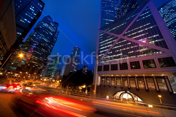 Stock photo: Fast moving cars at night