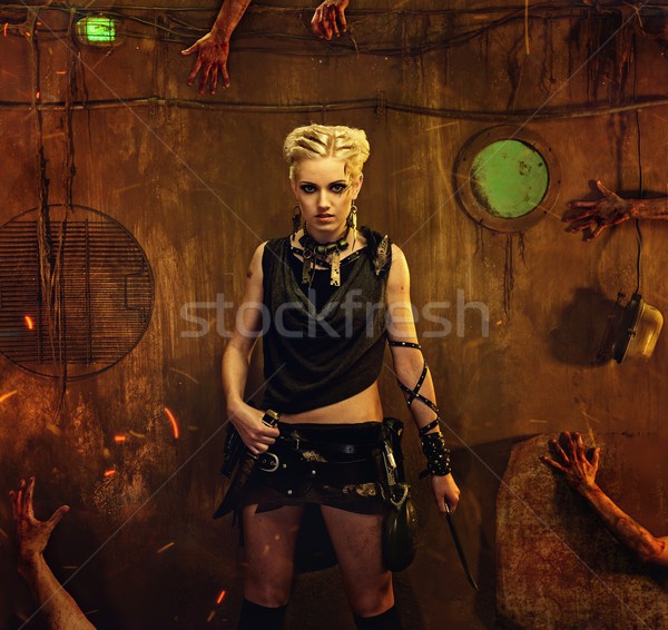 Woman in a bunker with zombie hands around her Stock photo © Nejron