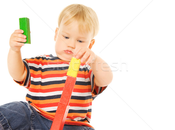 Beautiful young child playing intellectual game. Isolated on whi Stock photo © Nejron