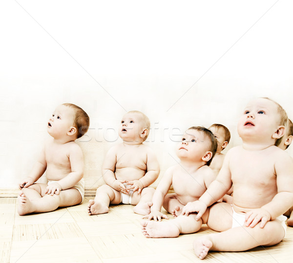Group of adorable toddlers looking at something Stock photo © Nejron