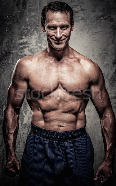 Homem corpo musculoso esportes fitness exercer Foto stock © Nejron