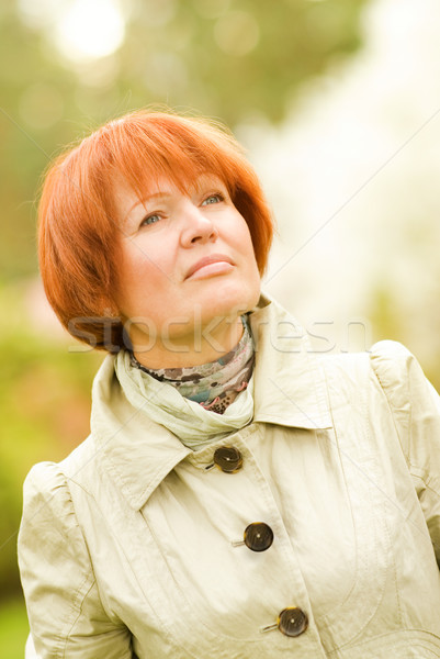 Beautiful middle-aged woman outdoors Stock photo © Nejron