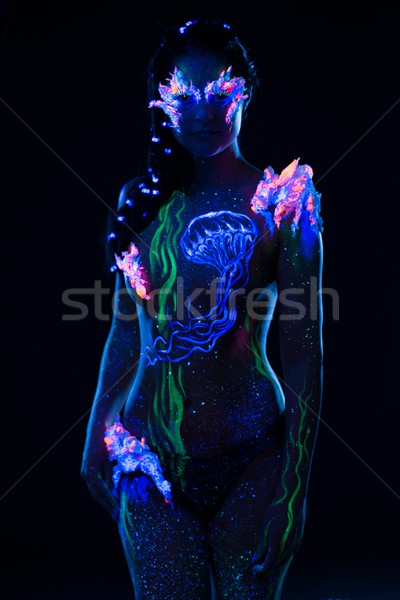 Gyönyörű nő testművészet izzó ultraibolya fény nő Stock fotó © Nejron