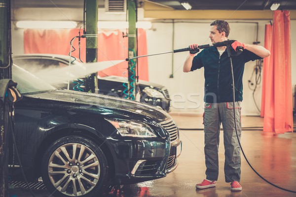 Man worker washing luxury car on a car wash  Stock photo © Nejron