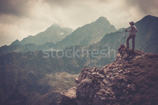 Woman hiker on a top of a mountain  Stock photo © Nejron