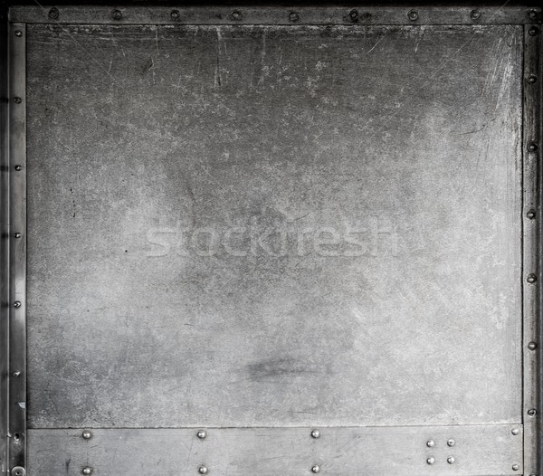 Scratched metallic background with rivets Stock photo © Nejron
