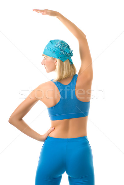 Young woman doing fitness exercise isolated on white background Stock photo © Nejron