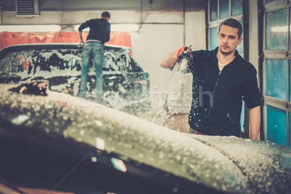 Man worker washing luxury car on a car wash  Stock photo © Nejron