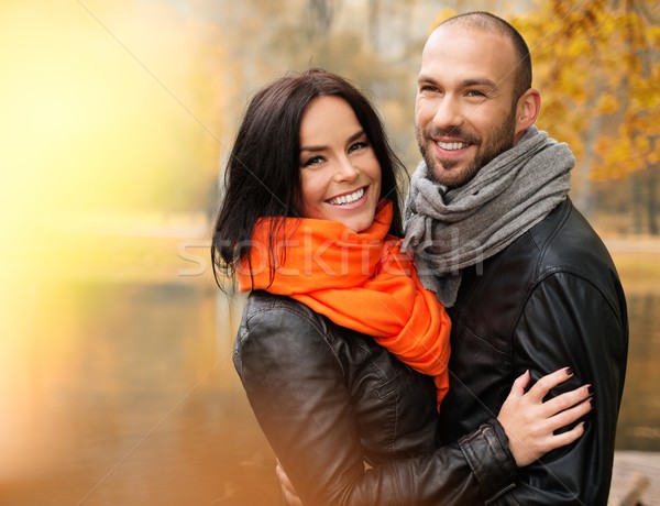 Happy middle-aged couple outdoors on beautiful autumn day Stock photo © Nejron