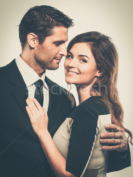 Happy smiling couple in suit and dress  Stock photo © Nejron