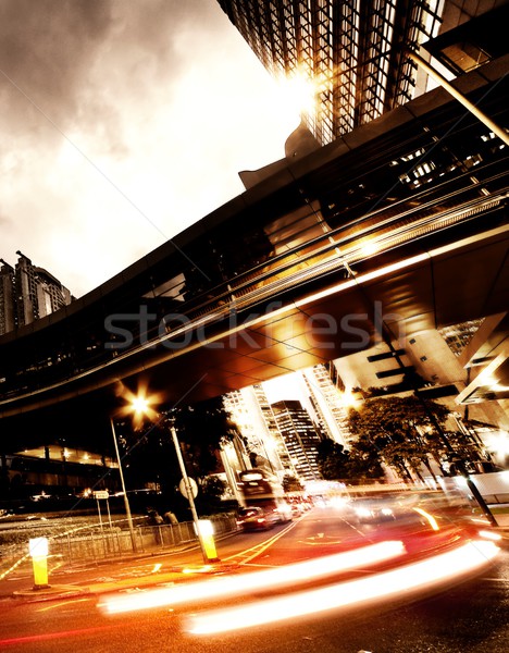 Fast moving cars at night Stock photo © Nejron