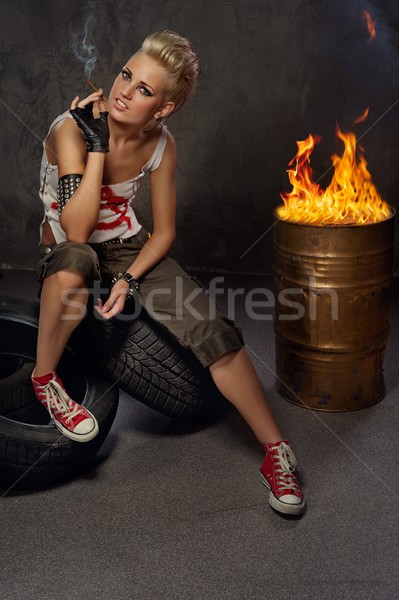 Punk girl smoking a cigarette Stock photo © Nejron