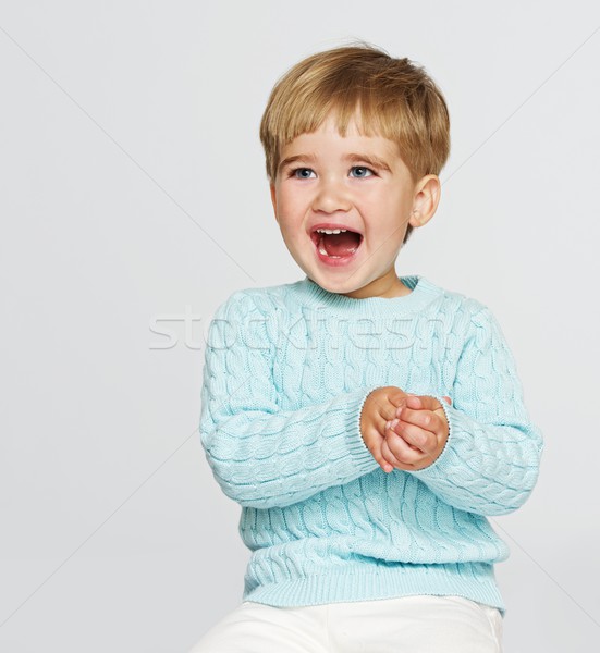 Happy baby boy in blue pullover Stock photo © Nejron