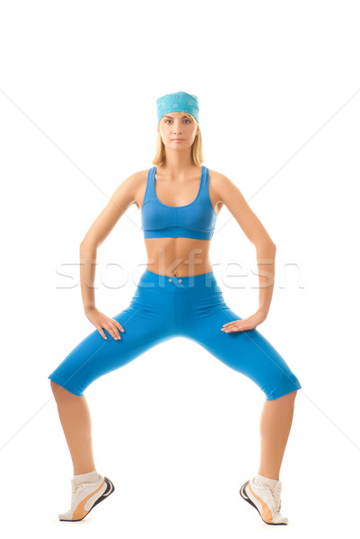Beautiful young woman doing fitness exercise isolated on white b Stock photo © Nejron