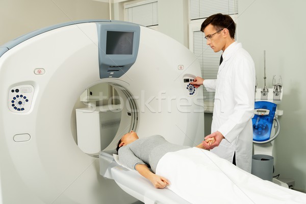 Young woman visiting computed tomography lab Stock photo © Nejron