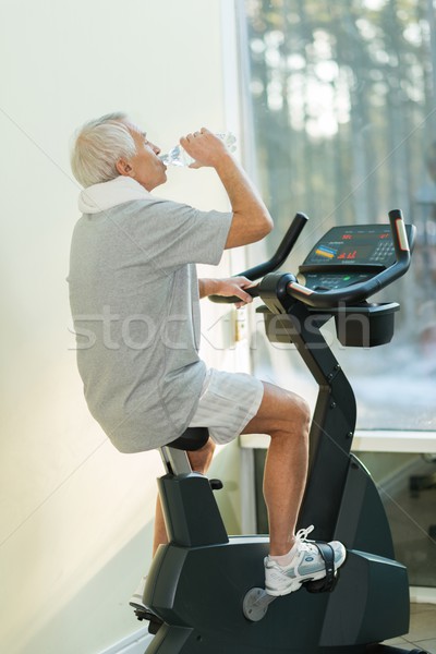 Senior man drinken oefening fiets fitness Stockfoto © Nejron