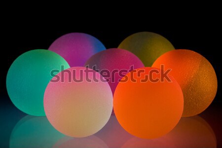 Stylish colorful balls with reflection. Isolated on black backgr Stock photo © Nejron