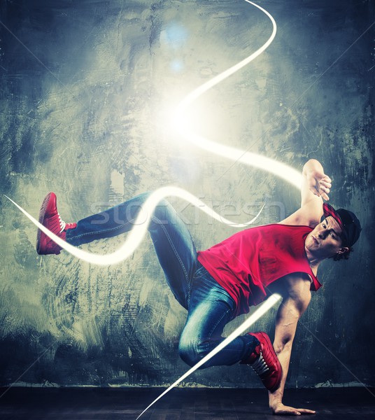 Elegáns férfi táncos mutat mágikus körül Stock fotó © Nejron