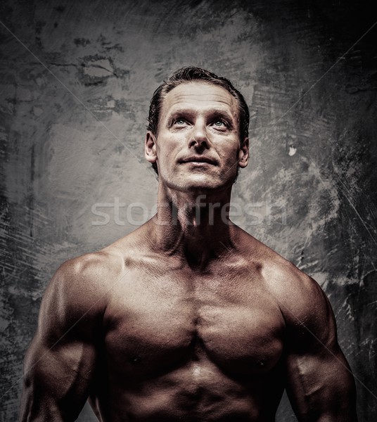 Om musculos sportiv fitness exercita Imagine de stoc © Nejron