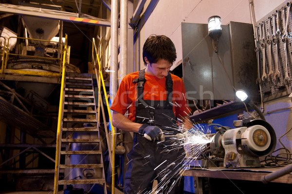 Operário de fábrica edifício homem trabalhar metal quarto Foto stock © Nejron