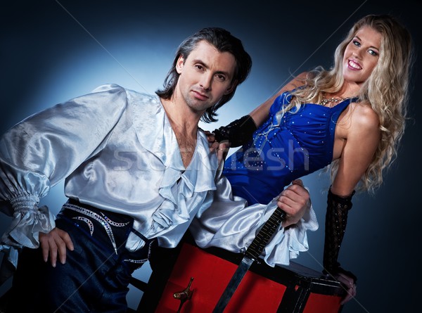 Séduisant couple épée boîte illusion [[stock_photo]] © Nejron