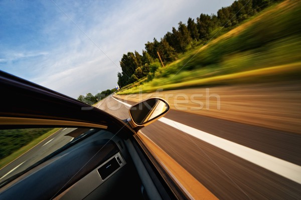 Fast moving car Stock photo © Nejron
