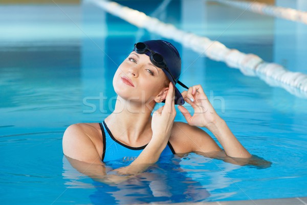 Fiatal nő visel kék úszik öltöny kalap Stock fotó © Nejron