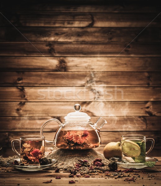 Teáskanna üveg csészék tea fából készült virág Stock fotó © Nejron