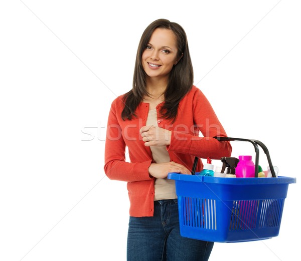 Beautiful cheerful brunette woman with basket full of cleansers  Stock photo © Nejron