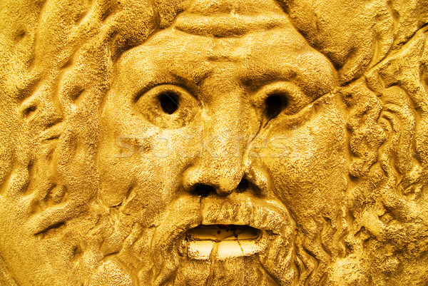 Dourado escultura cara homem olhos Foto stock © Nejron