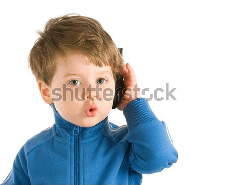 Little boy talking on the phone. Isolated on white background Stock photo © Nejron