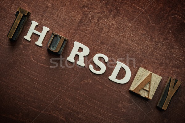 The word thursday written on wooden background Stock photo © Nejron