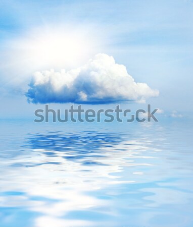 Small cloud and sun reflected in water Stock photo © Nejron