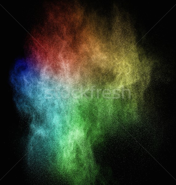 Colourful powder exploding isolated on black Stock photo © Nejron